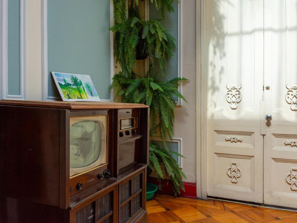 TV a/nebo společenská místnost v ubytování Hostal R10