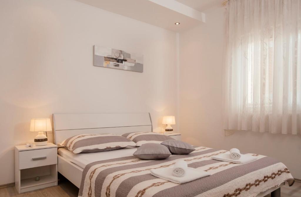 Katil atau katil-katil dalam bilik di Apartments Kolovrat