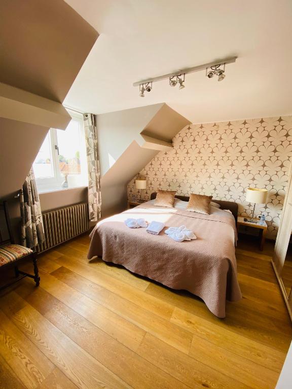 Postel nebo postele na pokoji v ubytování Gasthof Maerlant