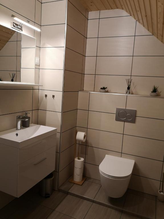 Koupelna v ubytování Apartments Gaby