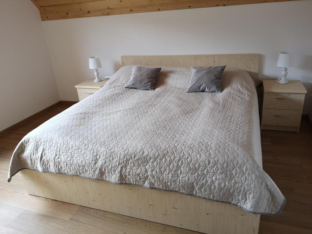 Postel nebo postele na pokoji v ubytování Apartments Gaby