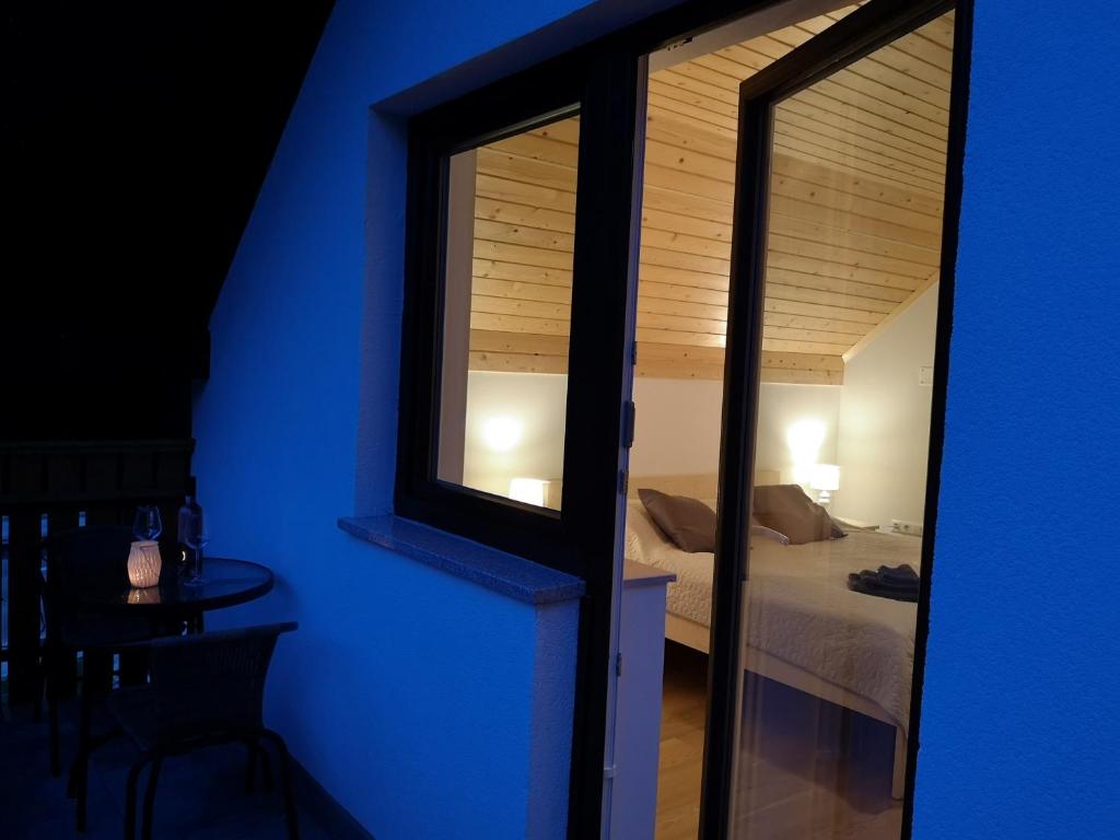 Postel nebo postele na pokoji v ubytování Apartments Gaby