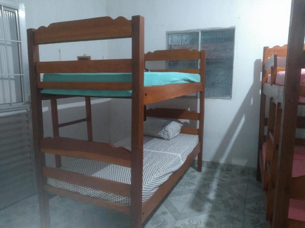 a couple of bunk beds in a room at Hostel Viajante Marajo in Soure