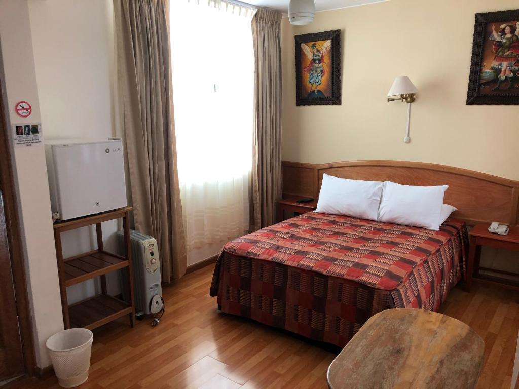 Postel nebo postele na pokoji v ubytování Awki´s Dream Hotel