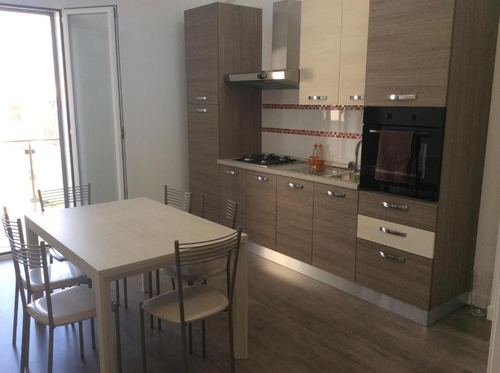 Kuchyň nebo kuchyňský kout v ubytování Casa Alessandra