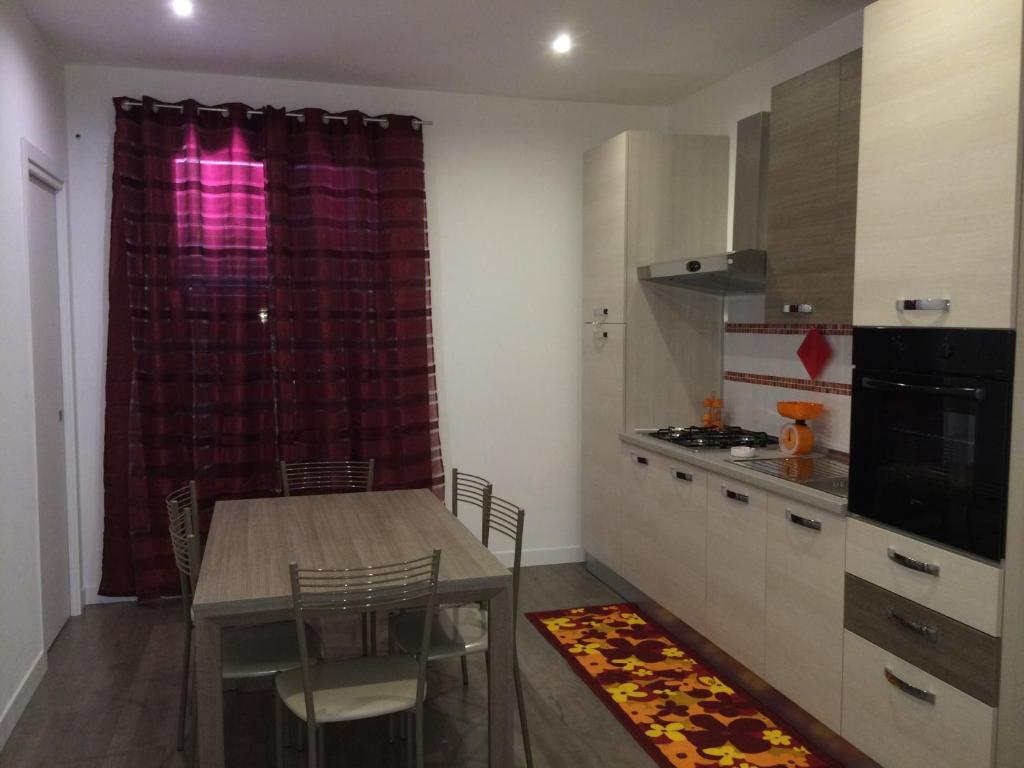 Kuchyň nebo kuchyňský kout v ubytování Casa Alessandra