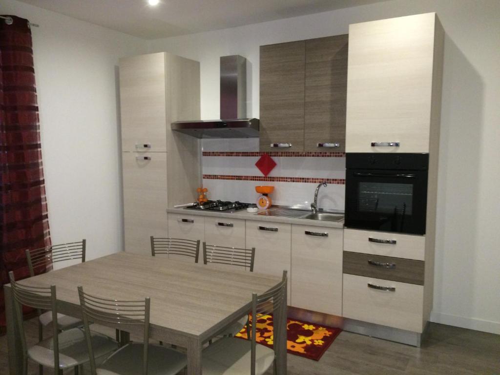 Kuchyň nebo kuchyňský kout v ubytování Casa Alessandra