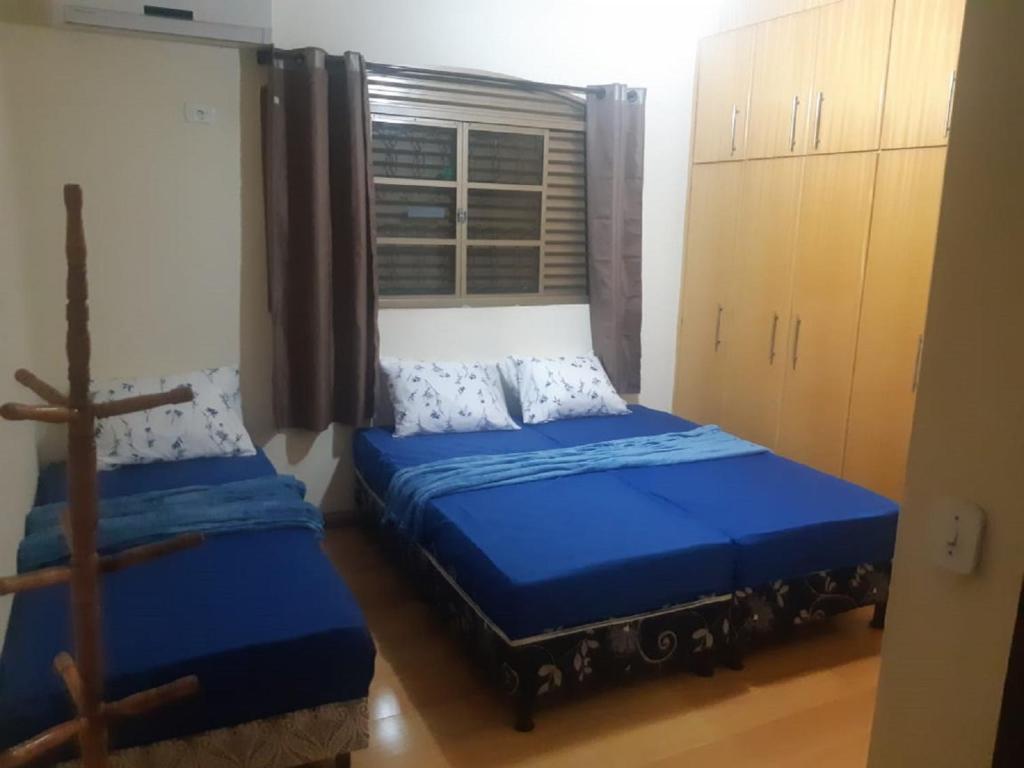 Postel nebo postele na pokoji v ubytování Cascais Quartos & Suítes