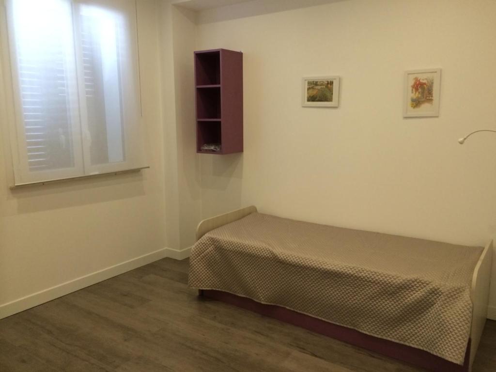 Postel nebo postele na pokoji v ubytování Casa Alessandra
