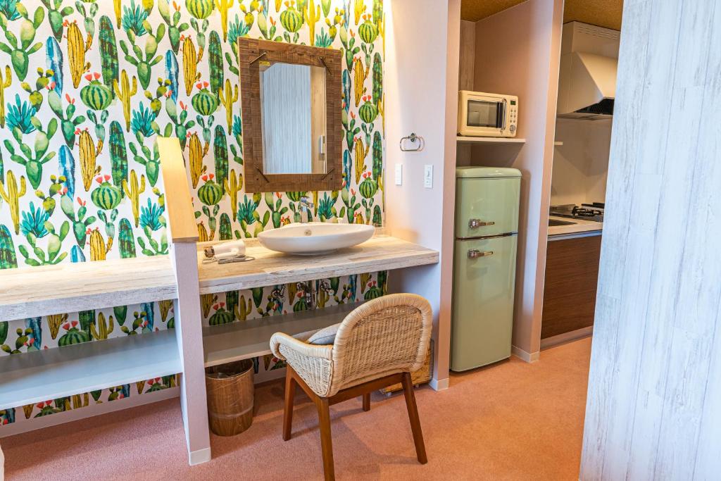 Kuchyň nebo kuchyňský kout v ubytování Palm Springs Miyakojima Resort