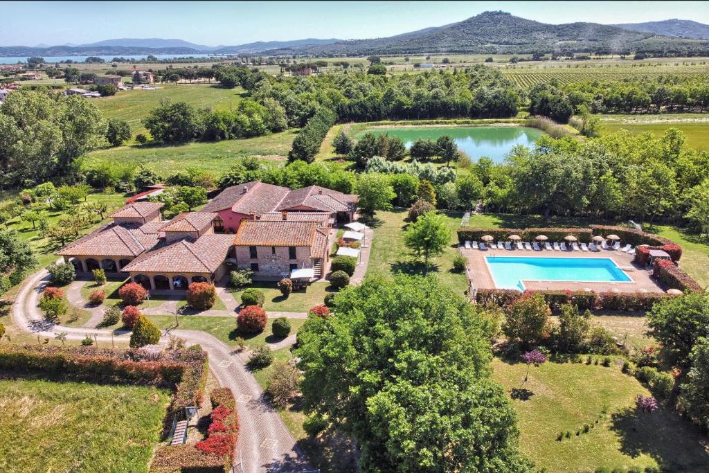 an aerial view of a estate with a pool and a house at Agriturismo La Fattoria in Panicarola