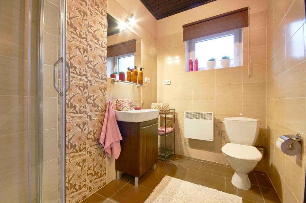 Kúpeľňa v ubytovaní Arenda Apartamenty&Domki całoroczne