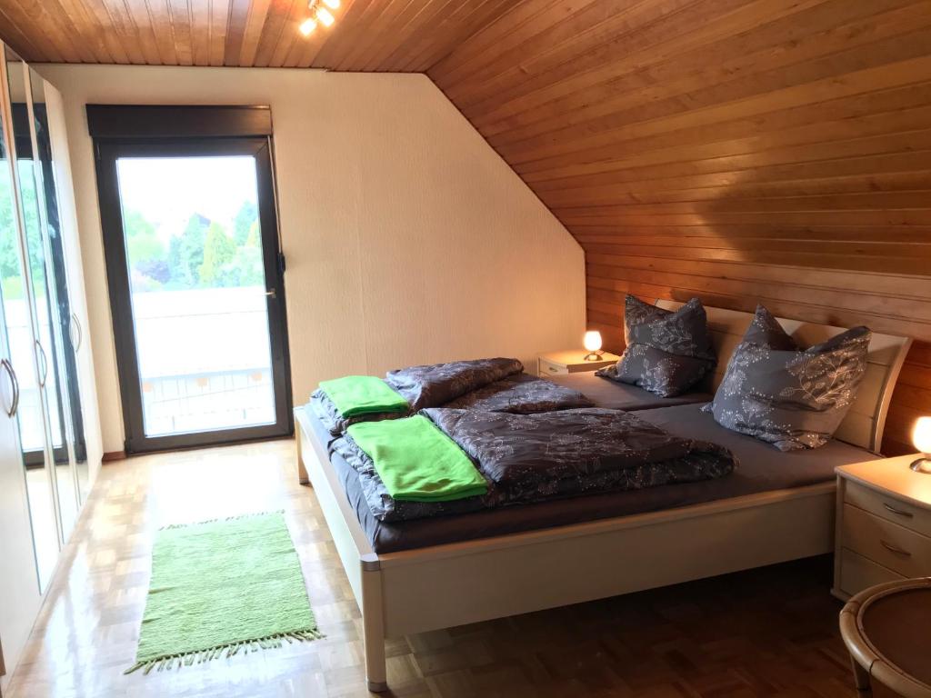Postel nebo postele na pokoji v ubytování Ferienhaus Riesling