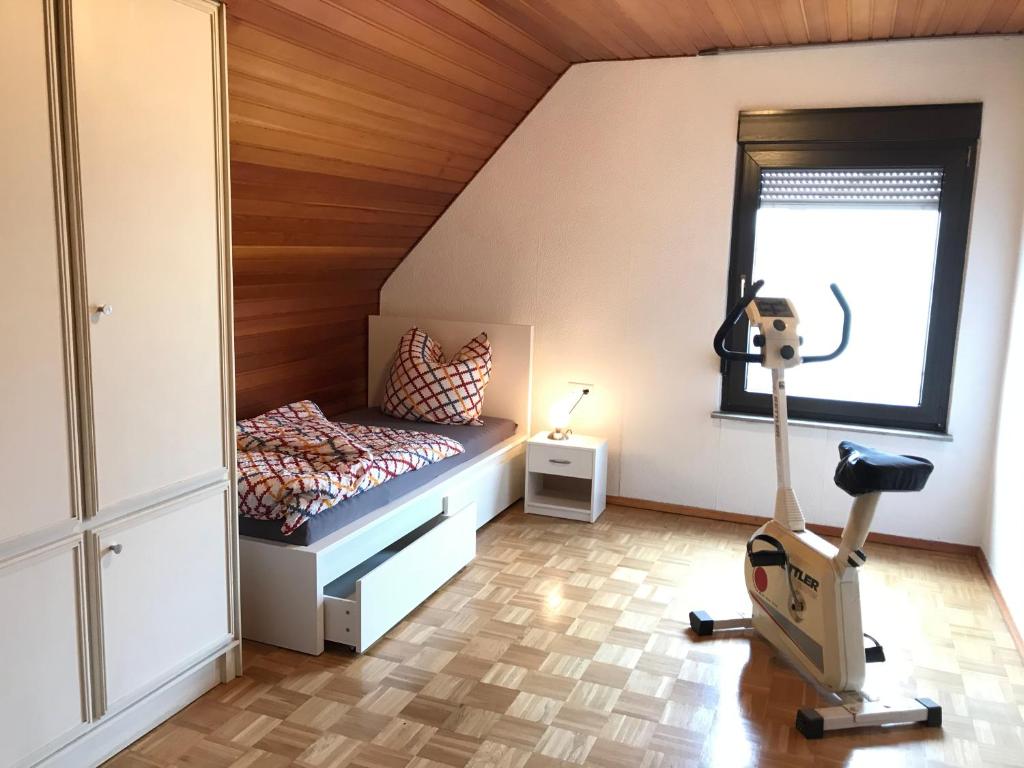Postel nebo postele na pokoji v ubytování Ferienhaus Riesling