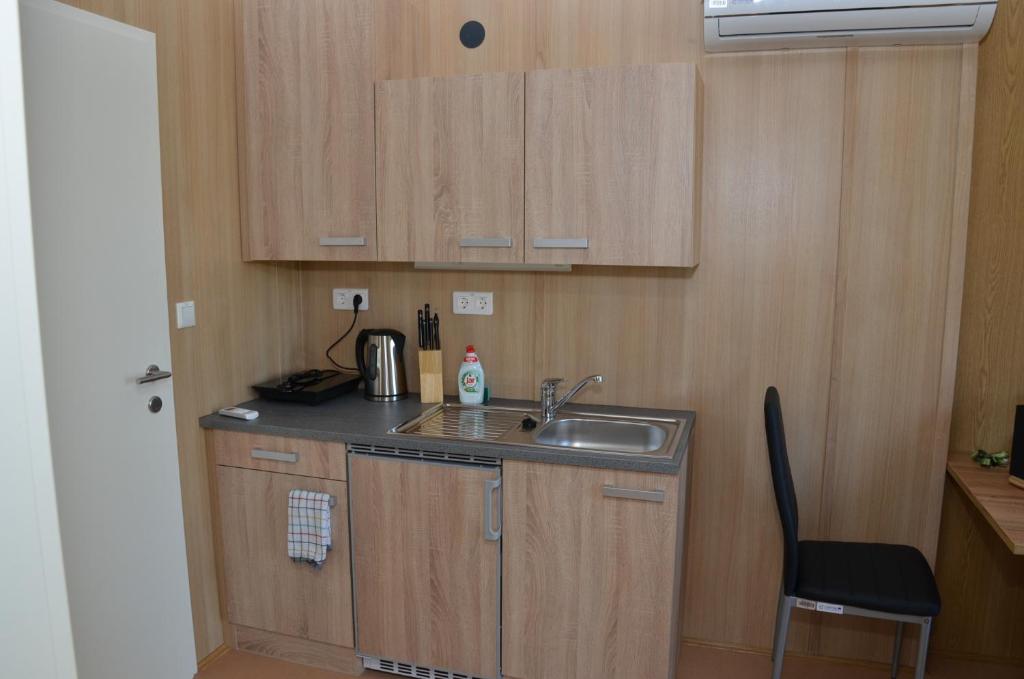 Kuchyň nebo kuchyňský kout v ubytování Počitniške hiške Murania