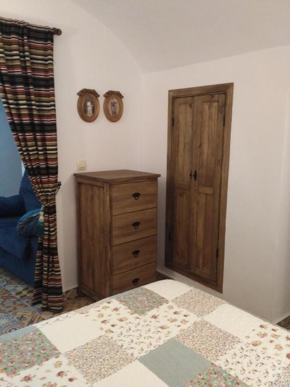 Postel nebo postele na pokoji v ubytování Casa Cueva EL ZAGAL