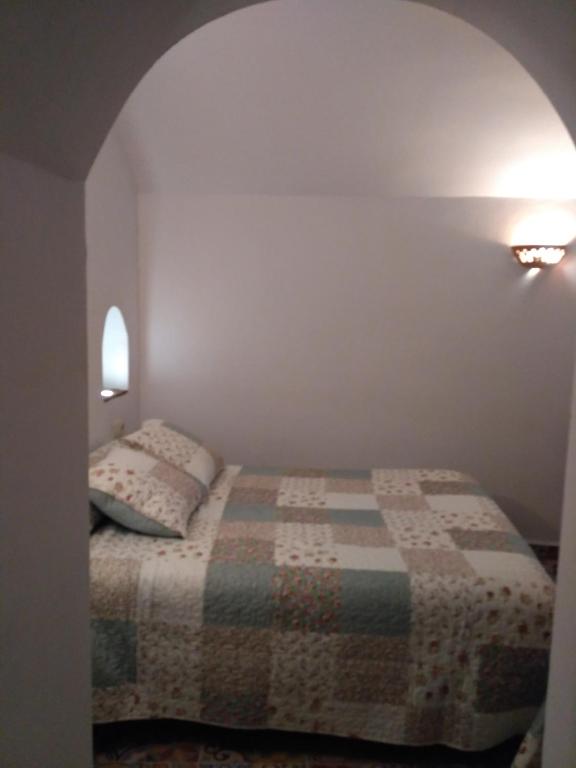 Postel nebo postele na pokoji v ubytování Casa Cueva EL ZAGAL