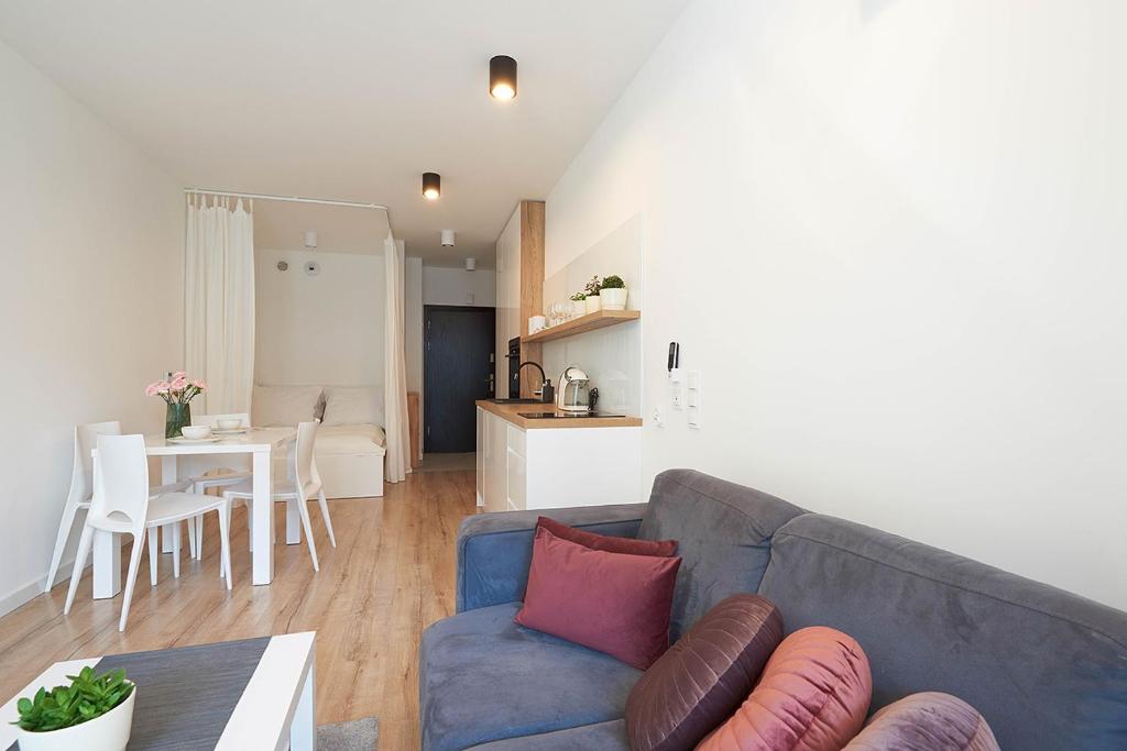 Posedenie v ubytovaní Apartament Dębowiec