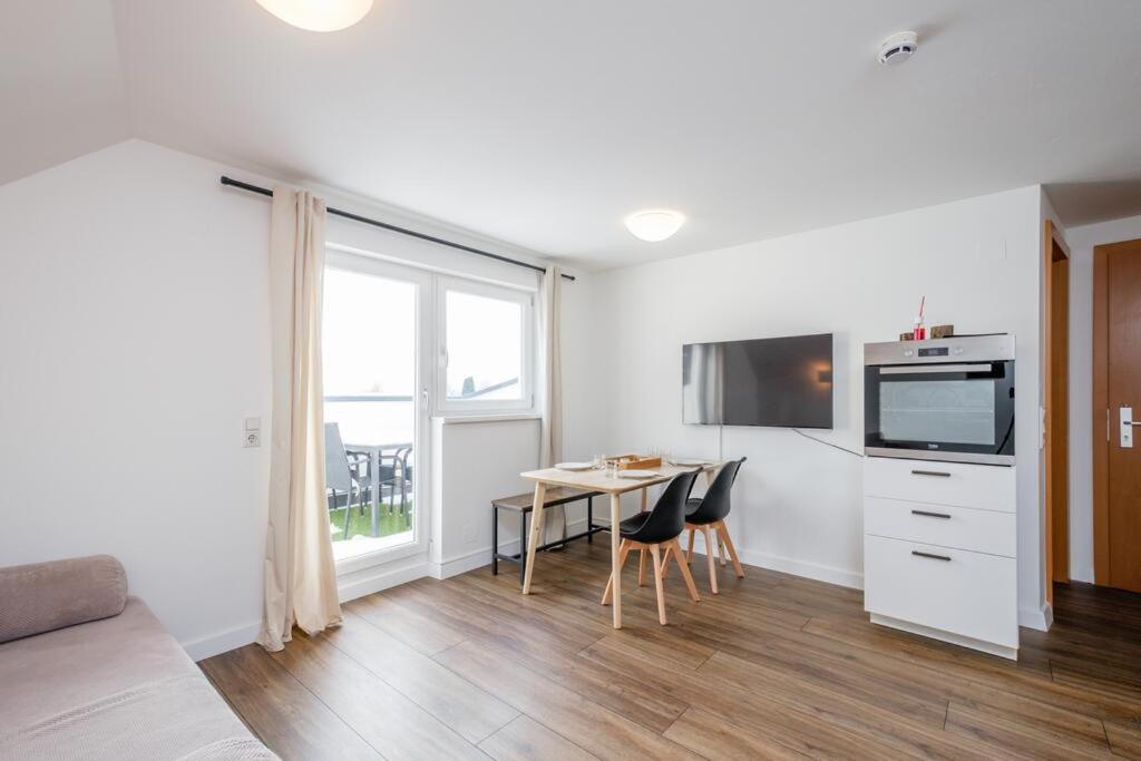 A kitchen or kitchenette at Alpen Apartment + Sauna und Netflix