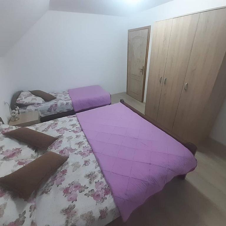 Postel nebo postele na pokoji v ubytování Apartman Bambi Zlatar