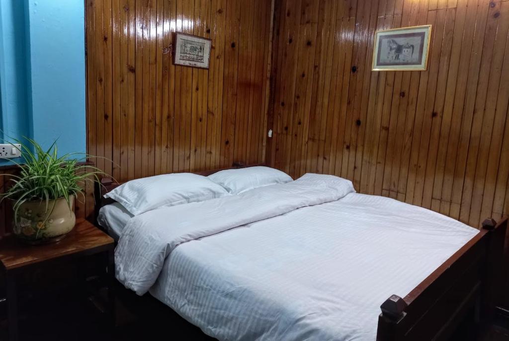 Postel nebo postele na pokoji v ubytování West Point Backpackers Hostel