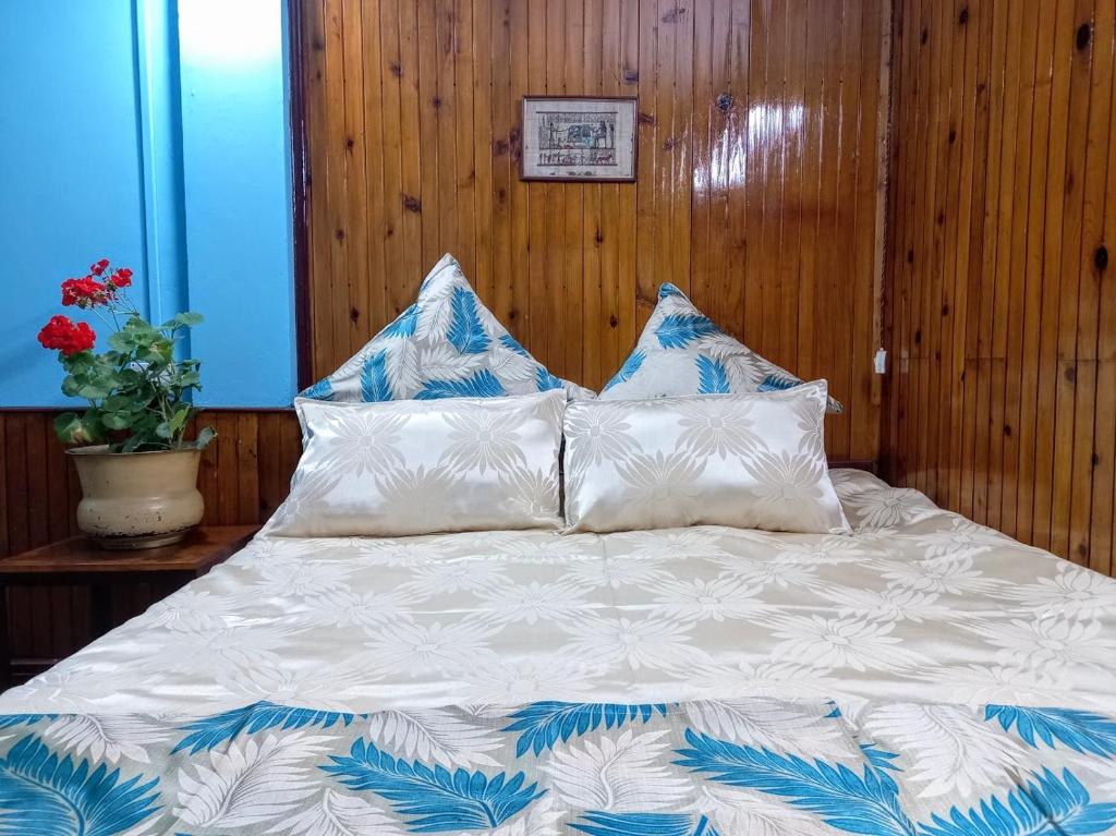 Postel nebo postele na pokoji v ubytování West Point Backpackers Hostel
