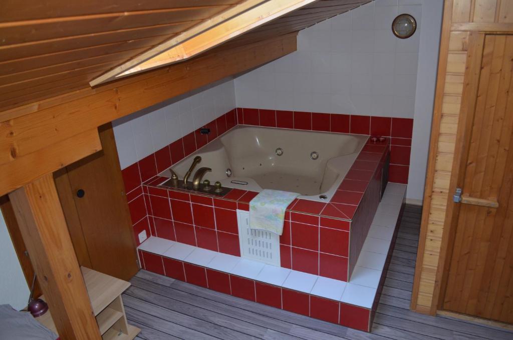 Postel nebo postele na pokoji v ubytování Logement chez l'habitant étage indépendant