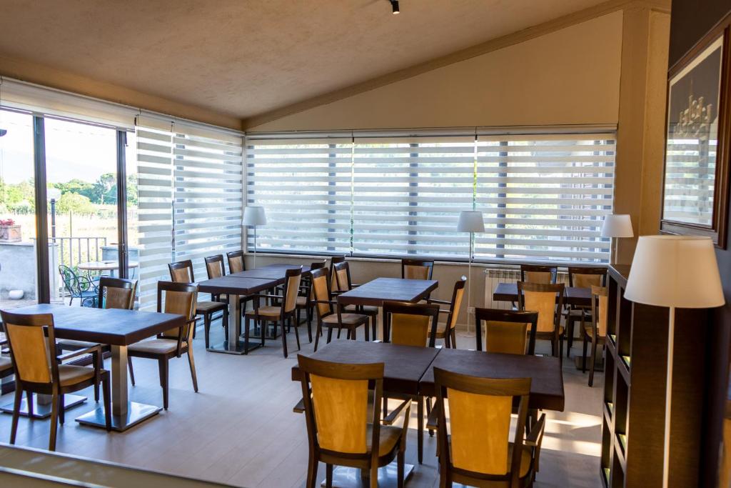 Reštaurácia alebo iné gastronomické zariadenie v ubytovaní Hotel & Spa Villa dei Mosaici