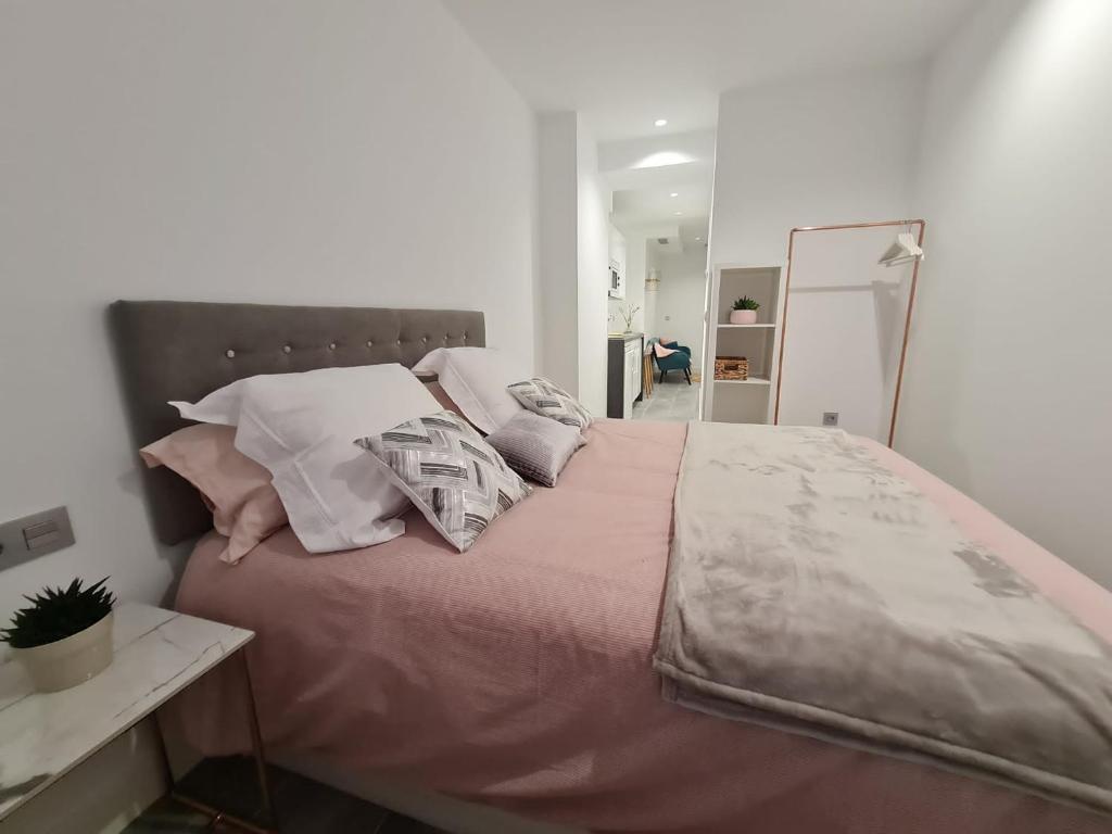 Postel nebo postele na pokoji v ubytování LoftinMalaga