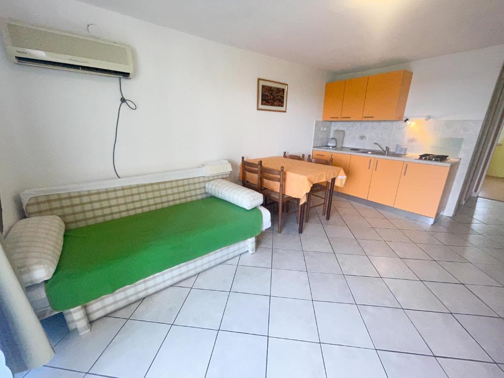 Kuchyň nebo kuchyňský kout v ubytování Apartmani Matković
