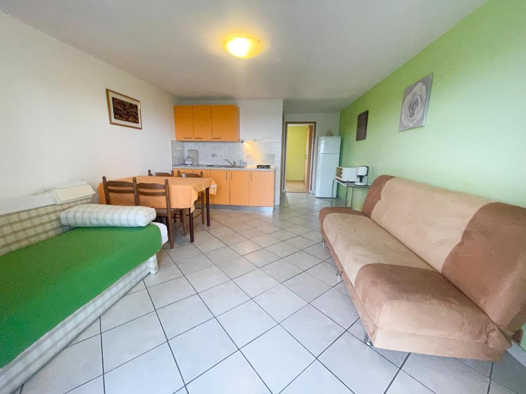 Kuchyň nebo kuchyňský kout v ubytování Apartmani Matković