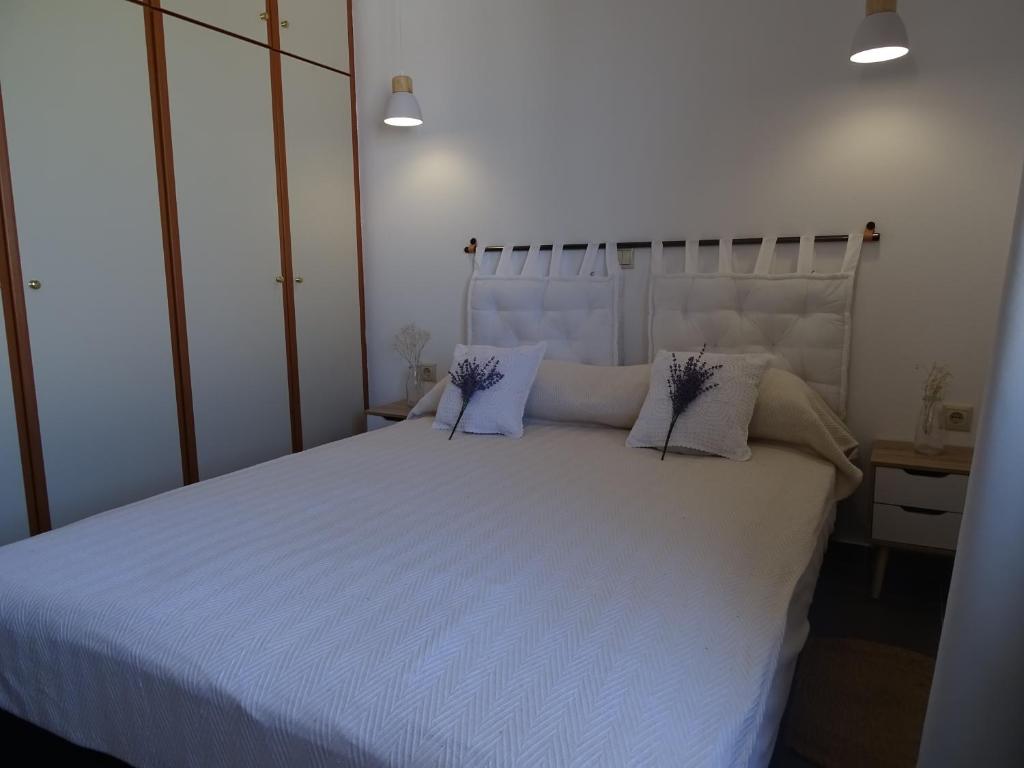 Łóżko lub łóżka w pokoju w obiekcie D&D apartments