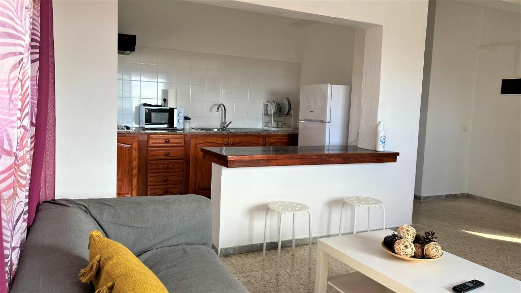 A kitchen or kitchenette at Apartamentos Los Arroyos