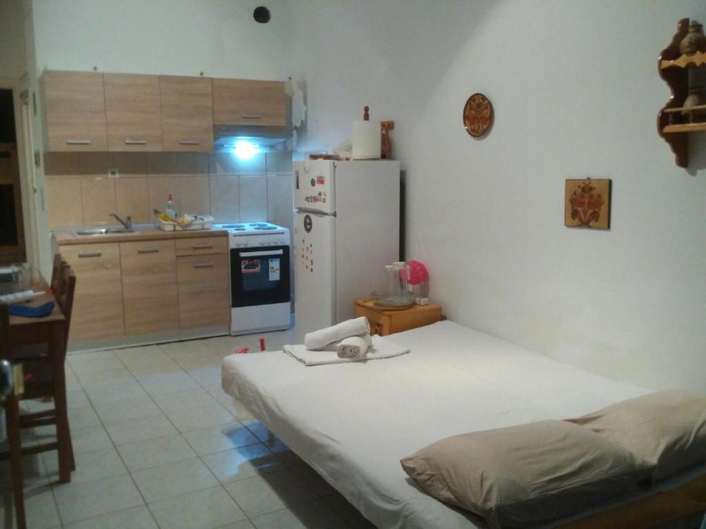 Kuchyňa alebo kuchynka v ubytovaní Cosy family apartment near the Sea
