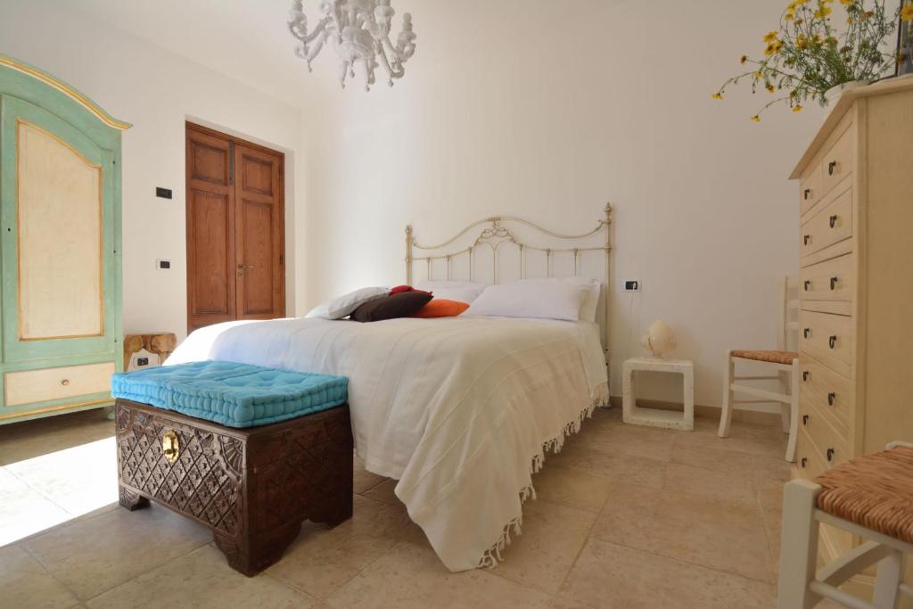 Postel nebo postele na pokoji v ubytování AGRITURISMO Masseria Spetterrata