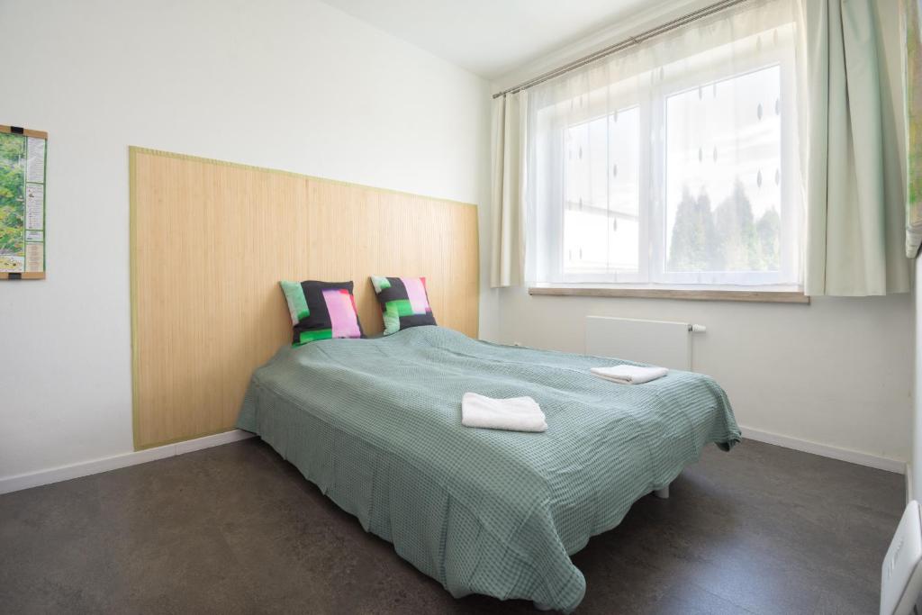 Postel nebo postele na pokoji v ubytování Sunny apartment
