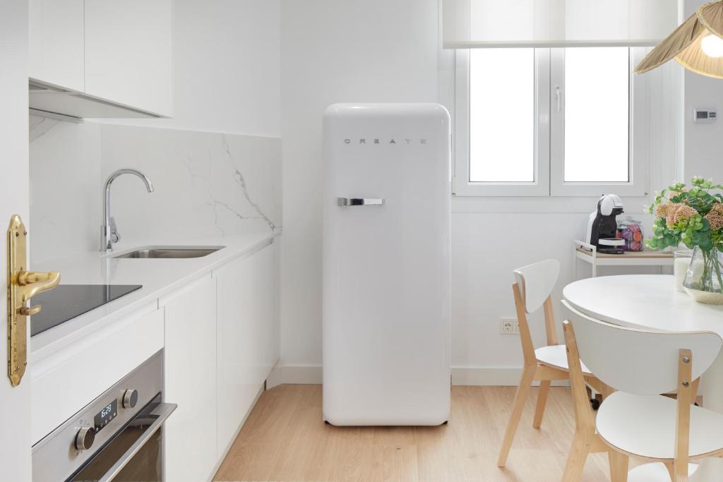 Kuchyňa alebo kuchynka v ubytovaní Moneo by FeelFree Rentals