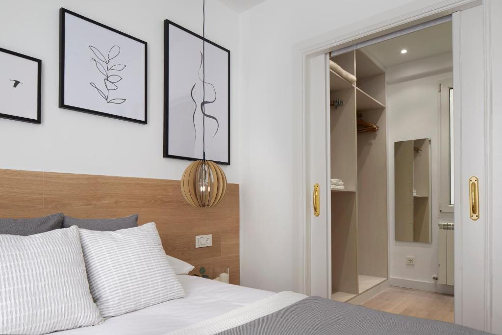 Posteľ alebo postele v izbe v ubytovaní Moneo by FeelFree Rentals