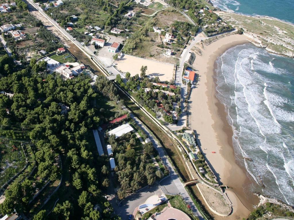 an aerial view of a beach and the ocean at Althea Village Residence in Vieste