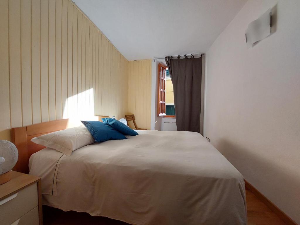 Postel nebo postele na pokoji v ubytování Mariasole Rooms