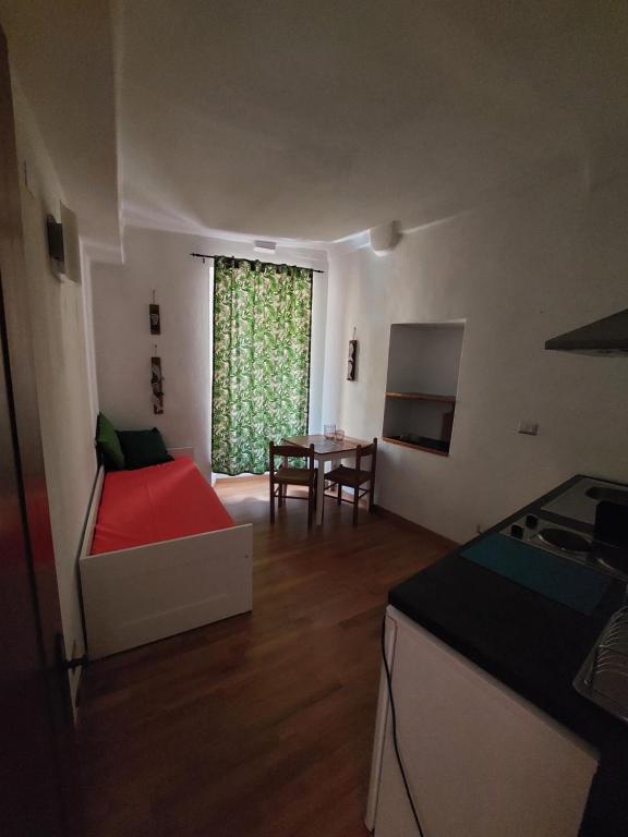 Postel nebo postele na pokoji v ubytování Mariasole Rooms