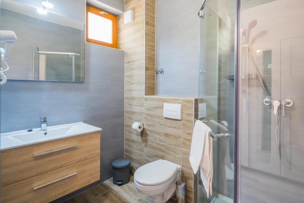 Koupelna v ubytování Holiday Hotel Siófok