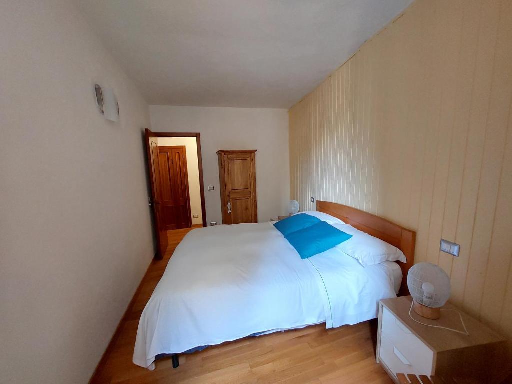 Postel nebo postele na pokoji v ubytování Mariasole Rooms