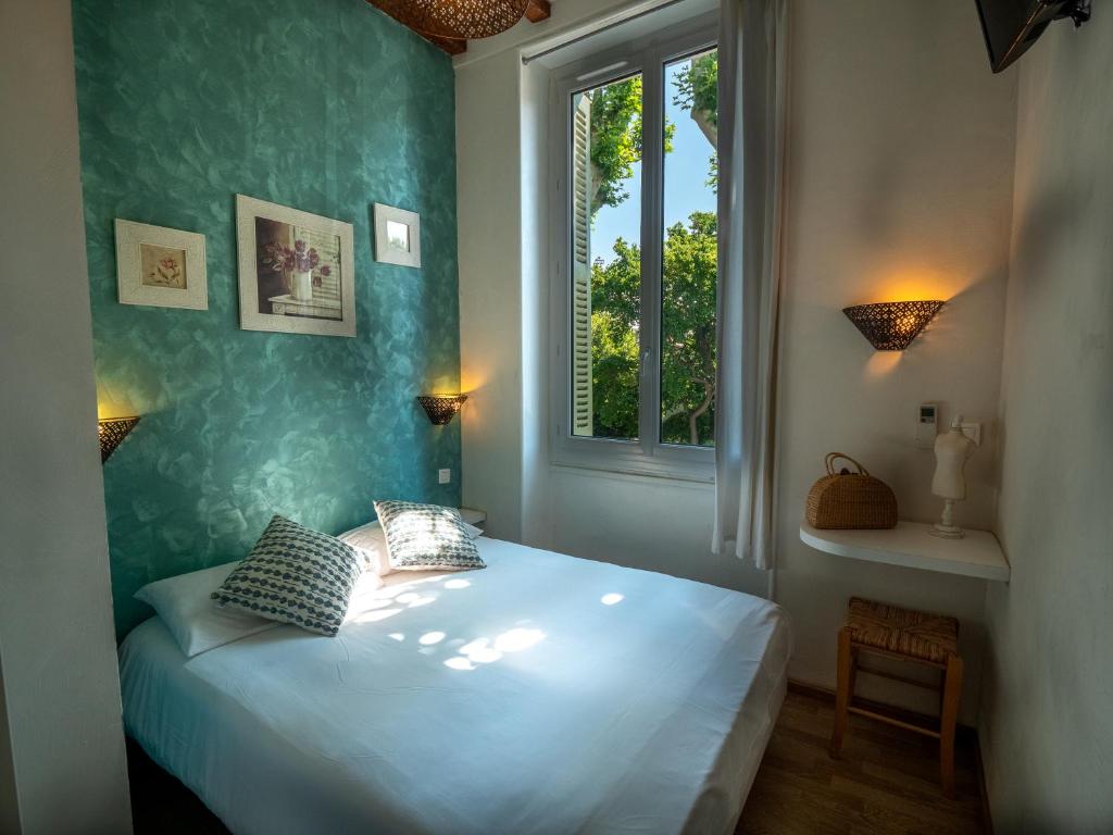 Postel nebo postele na pokoji v ubytování Altera Roma Hôtel