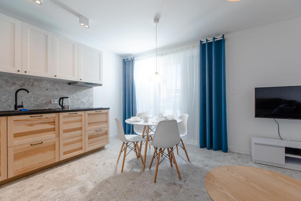 Kuchyň nebo kuchyňský kout v ubytování Resort Apartamenty Klifowa Rewal 59