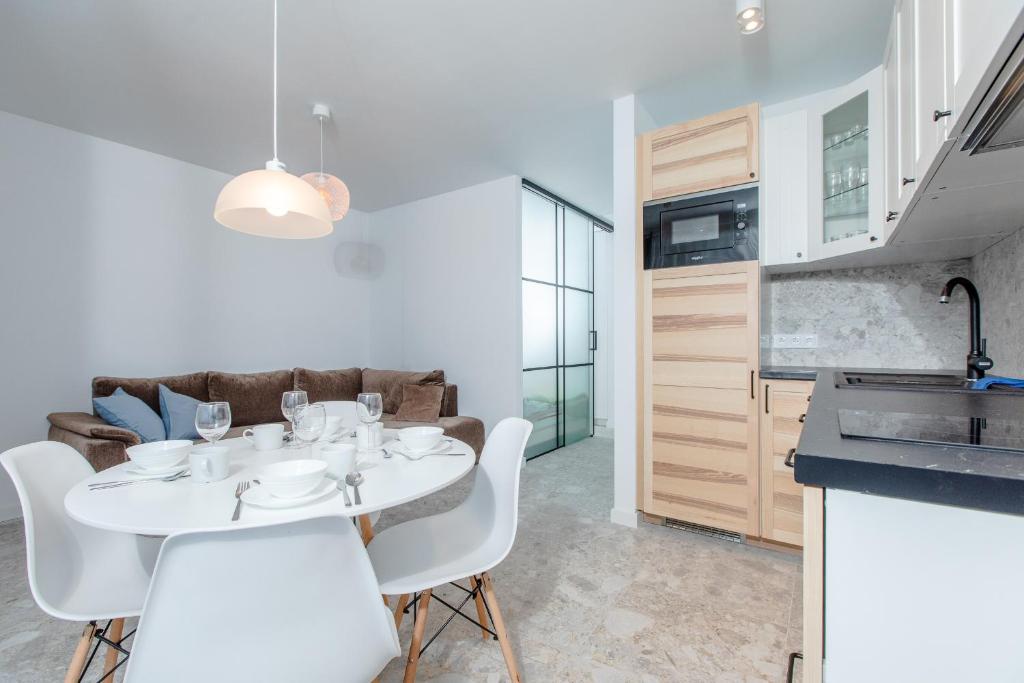 Kuchyň nebo kuchyňský kout v ubytování Resort Apartamenty Klifowa Rewal 59