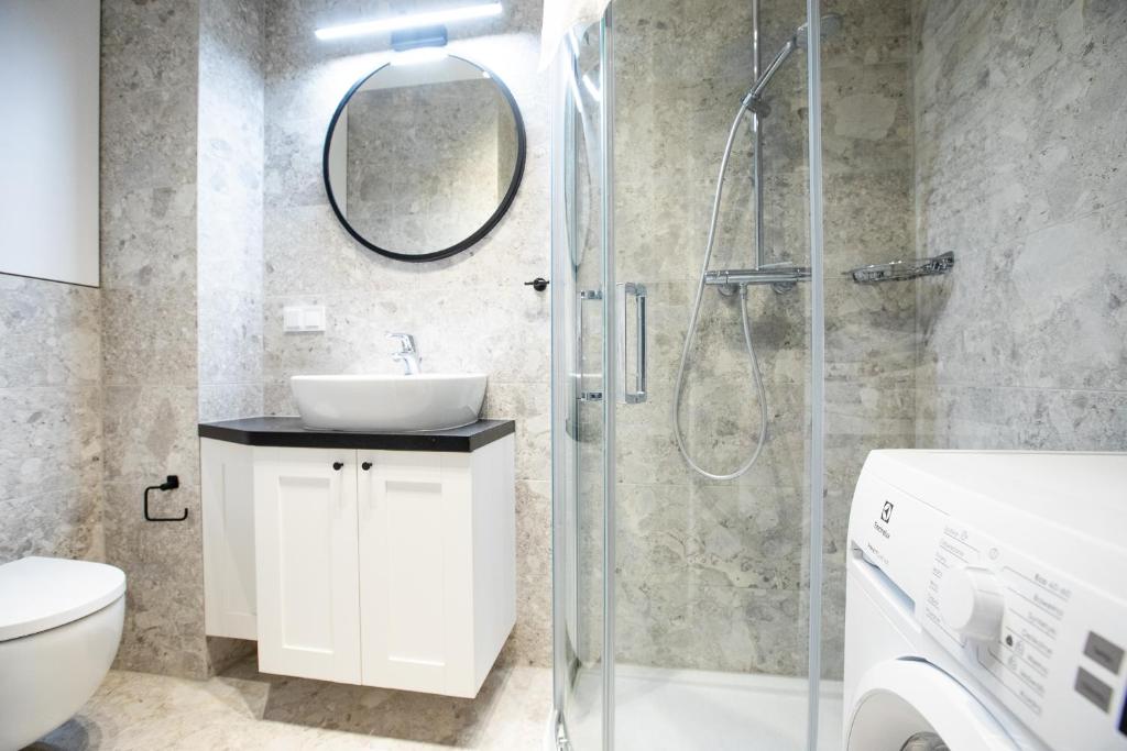 Koupelna v ubytování Resort Apartamenty Klifowa Rewal 59
