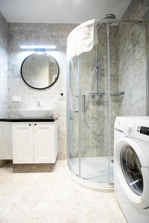 Koupelna v ubytování Resort Apartamenty Klifowa Rewal 59