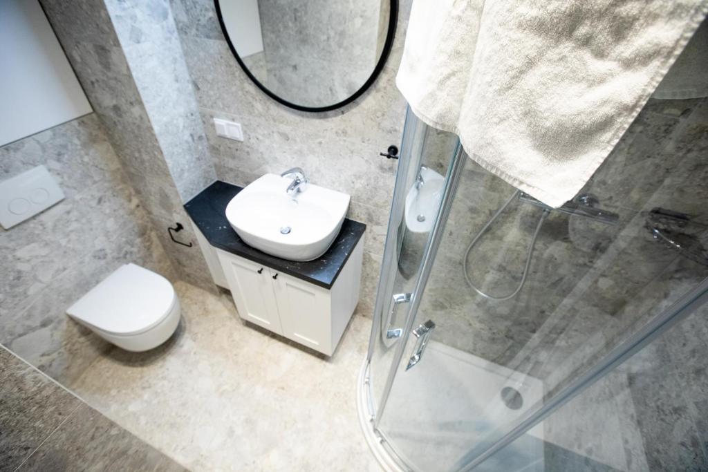 Koupelna v ubytování Resort Apartamenty Klifowa Rewal 59