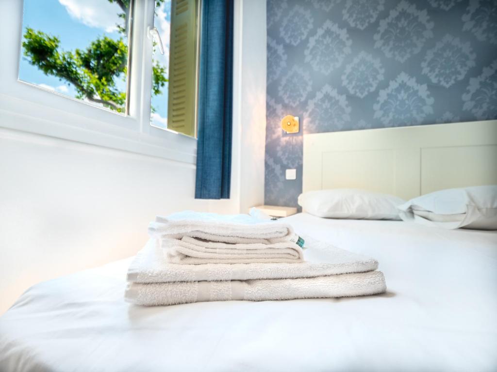Postel nebo postele na pokoji v ubytování Altera Roma Hôtel